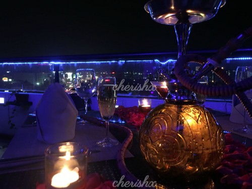 Romantic Dinner with decorated table on the rooftop in Bangalore