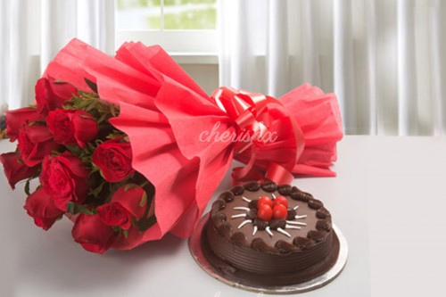 A Rose bouquet with a chocolate cake.