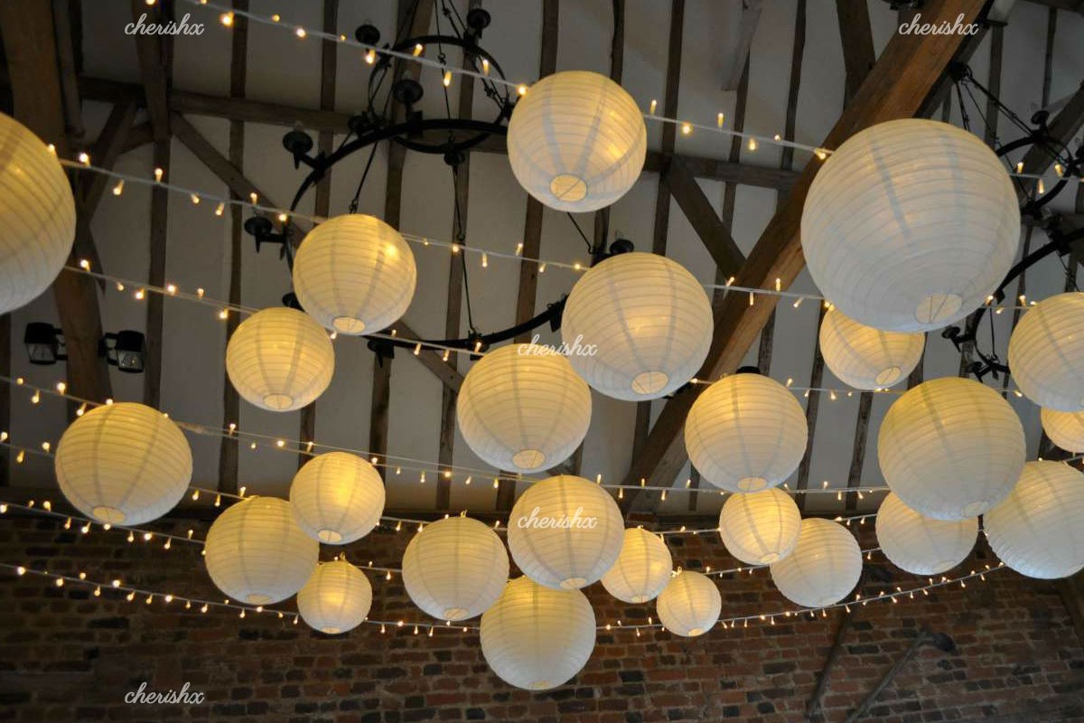 Celebrate your 25th or 50th anniversary with CherishX's Paper Lanterns and Fairy lights Anniversary Room Decoration.