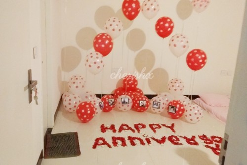 Set up with polka dots balloons and rose petals for a mindblowing surprise.