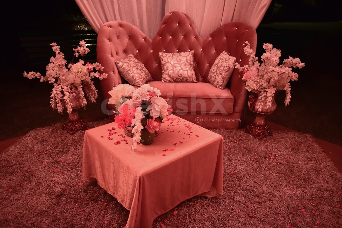 A gorgeous sofa set up in the cabana for a romantic date.