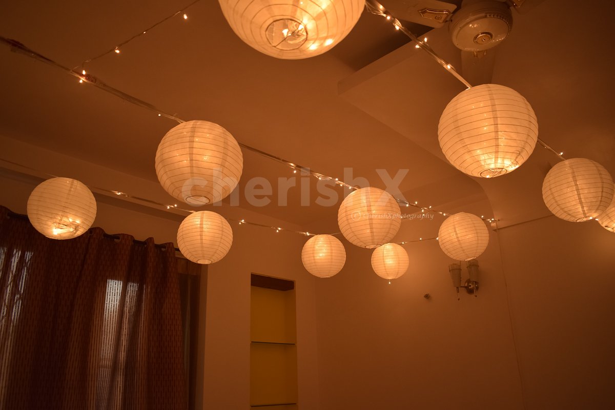 birthday surprise ideas in home with hanging lanterns 