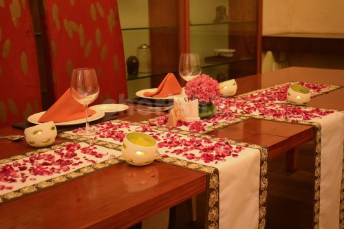 Candlelight Dinner with Flower Petals Table Decoration