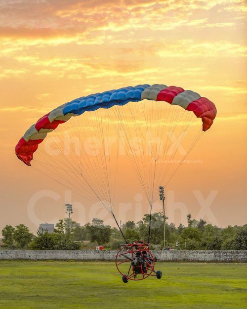 Enjoy the sunset with this Paramotoring Acitivity
