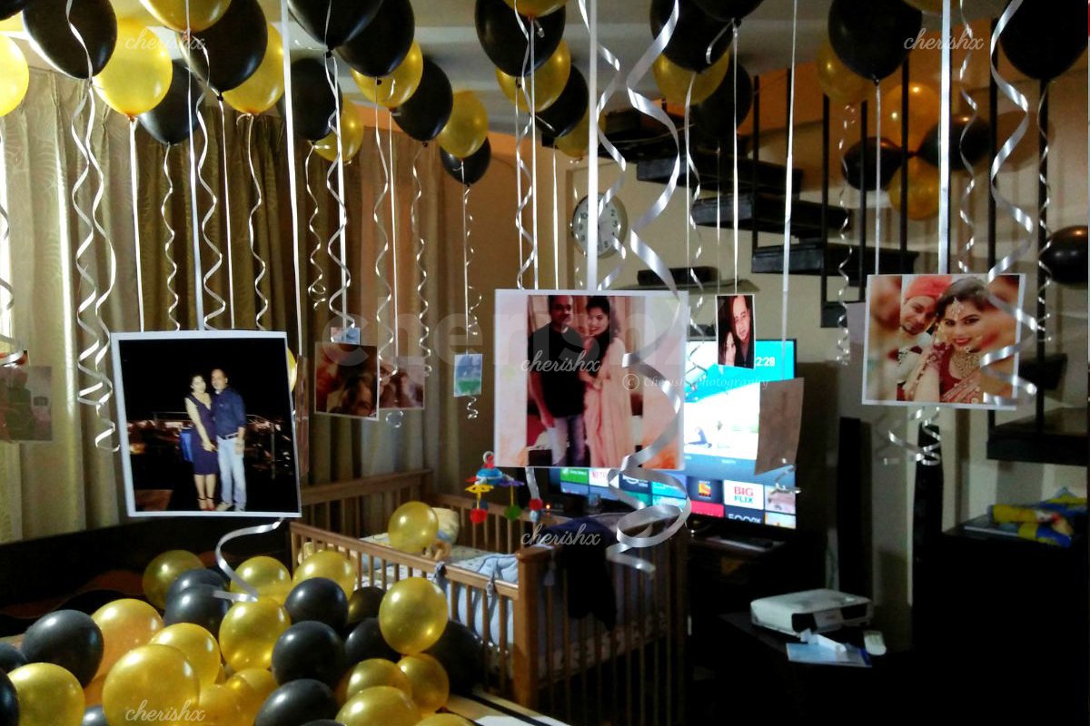 CherishX's Balloon Surprise Decor with hanging photos to surprise your close ones.