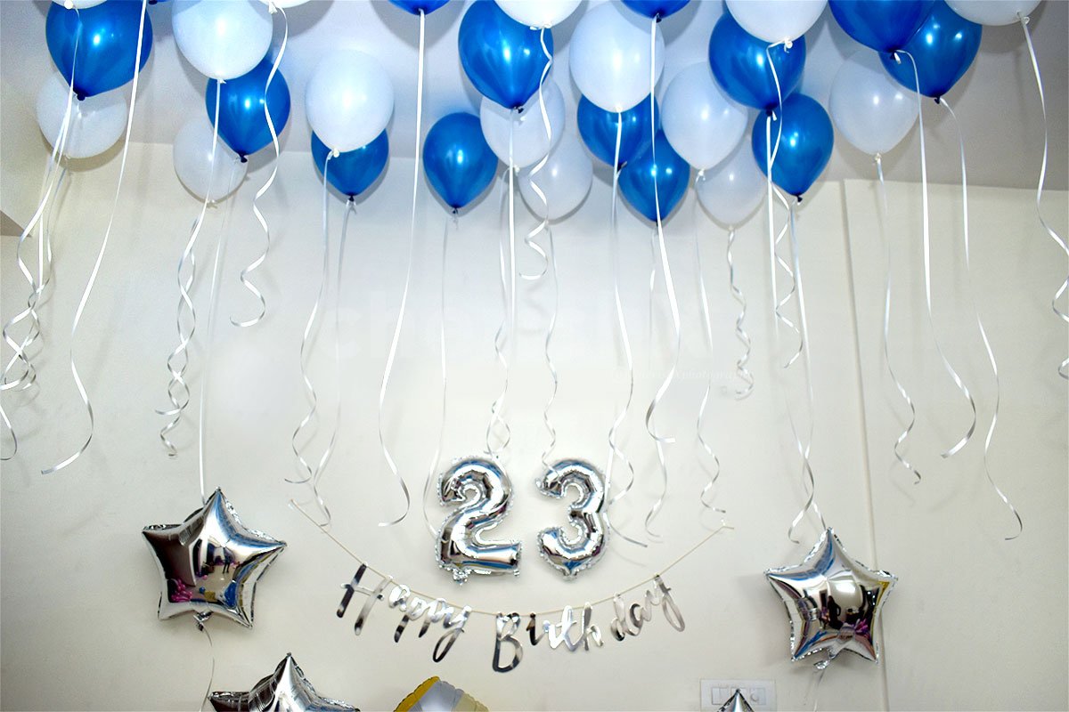 A birthday balloon room decor in a blue colour theme.