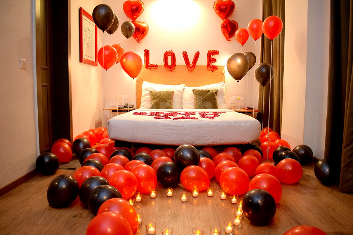 surprise balloon decoration ideas at home for him with red and black balloons