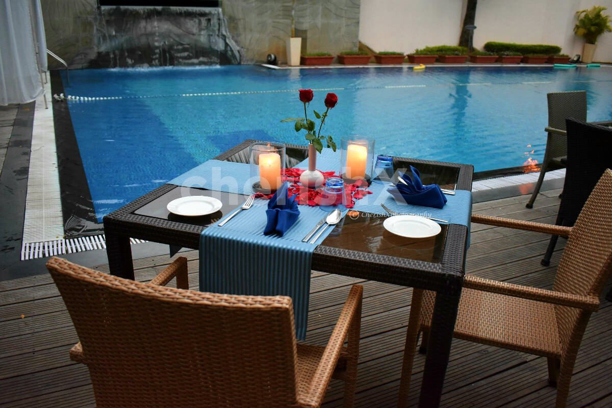 Romantic Poolside Candle light Dinner In Pune with a Stay