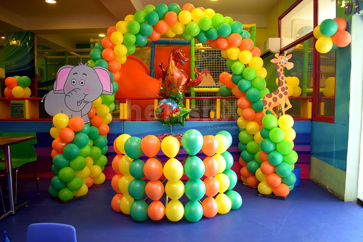 A dome-like structure made up of balloons with different colours to make the decor look attractive.