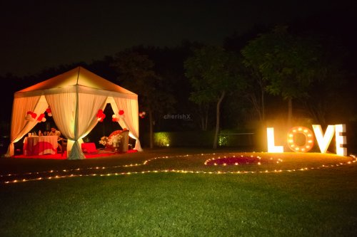 Cabana Candlelight Dinner with big LOVE illuminated Letters at Dwarka