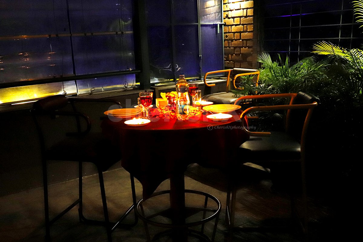 Surprise your partner with this beautiful rooftop candle light dinner.