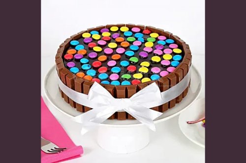 High rated and delicious kitkat gems cake delivered to your home