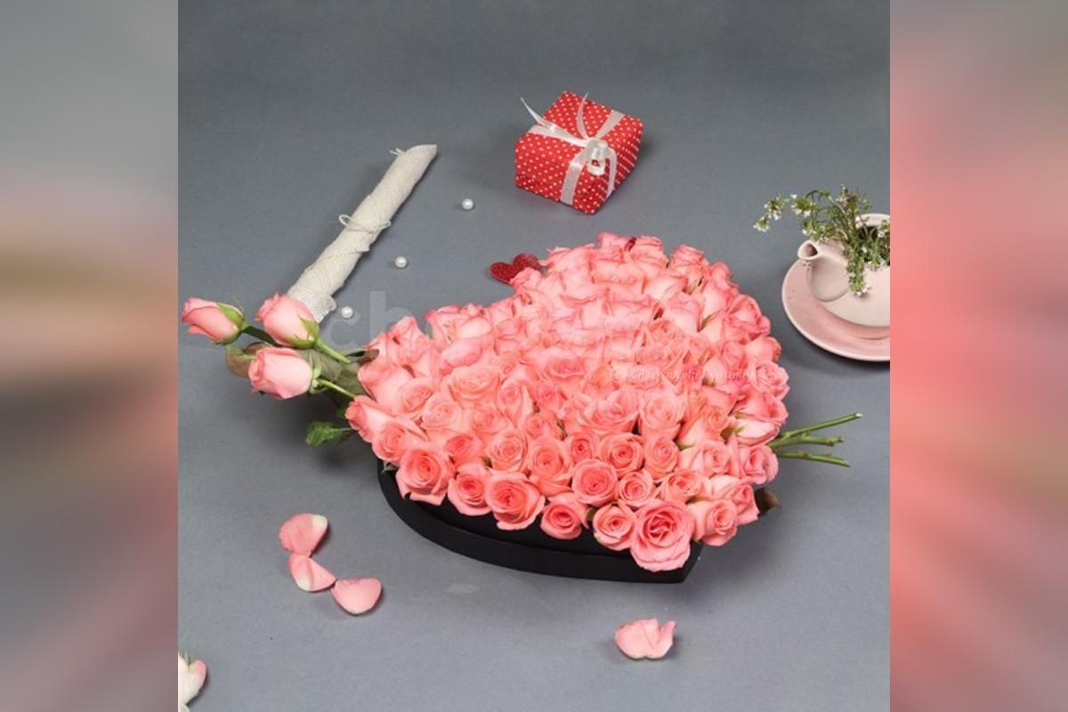 A Beautiful 50 Pink roses heart arrangement online delivery