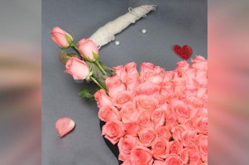 A Beautiful 50 Pink roses heart arrangement  by cherishx