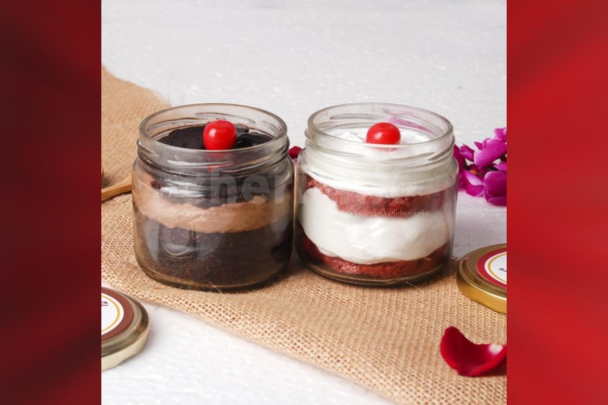 12 Red rose bouquet with 2 cake jars - red velvet and chocolate truffle flavors home delivery