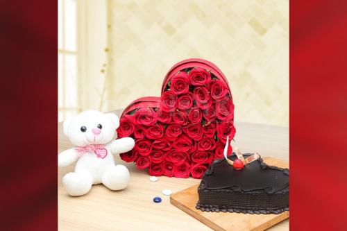 A 35 gorgeous heart shape red roses arrangement with heart shape chocolate truffle and 6 inch teddy