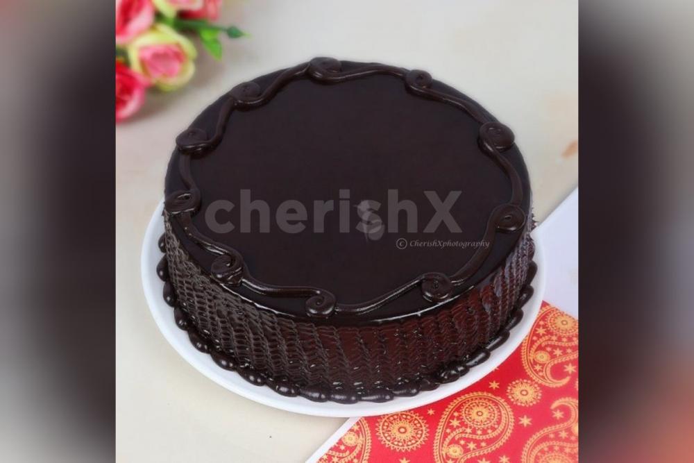 Order online Rakhi with chocolate truffle cake and get delivered at home