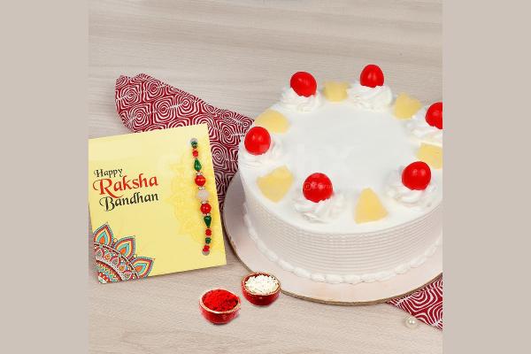Rakhi and pineapple cake home delivery