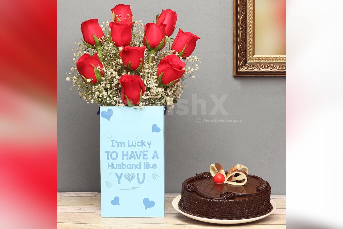 10 red roses box with a chocolate truffle cake
