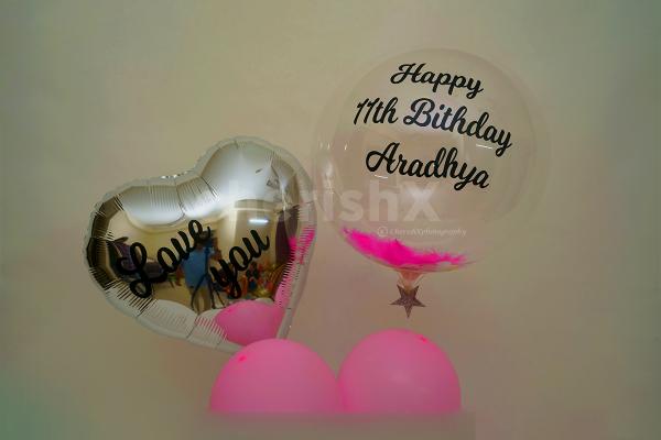 Tell someone you love them with this beautiful bubble balloon, filled with feathers through cherishx