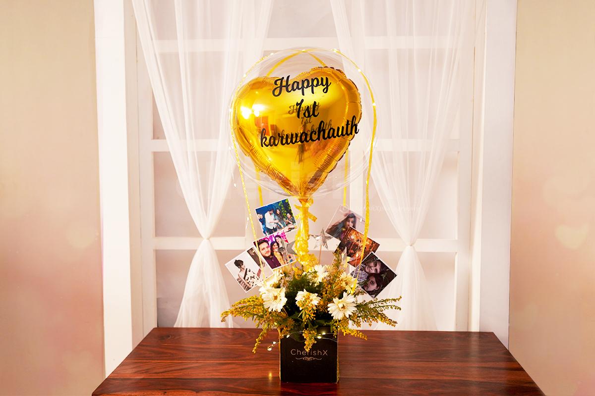 Gift this attractive bouquet with a balloon on birthdays, anniversaries and Karwa Chauth.