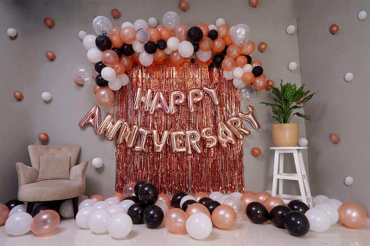 Balloon Decoration for Anniversary with Rosegold, Black and White Balloons