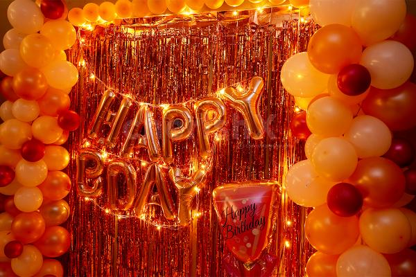 A Glorious Rosegold Happy Birthday Room Decoration to surprise your close ones at home.