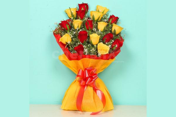 18 red & yellow roses in Red and Yellow Color Paper Bouquet