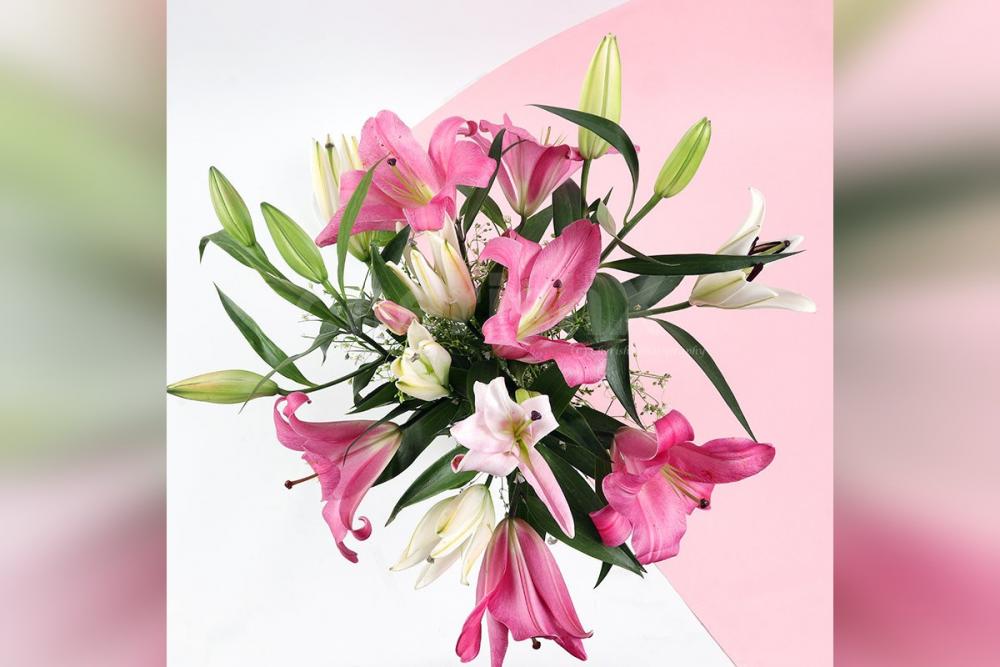 Send a simple 6 Pink and White Lilies in Cylindrical Glass Vase Bouquet