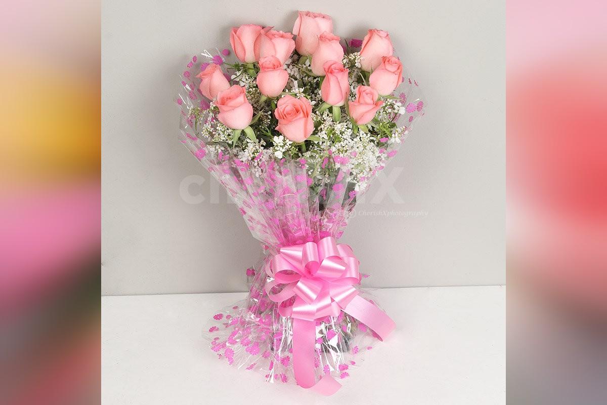 Send a simple 12 Pink Rose with a 12'' White Teddy and 5 Kitkats (18gm ...