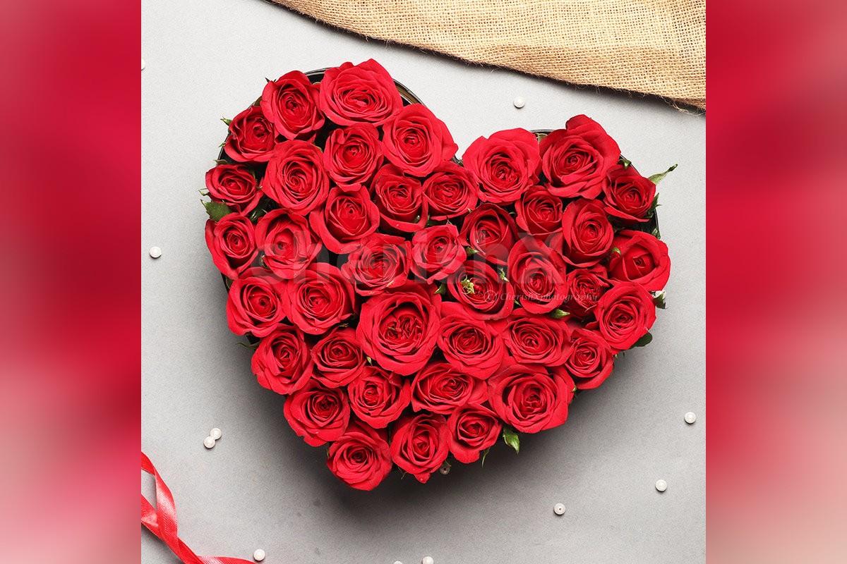 send-a-simple-35-red-rose-in-heart-shaped-arrangement-box-with-a