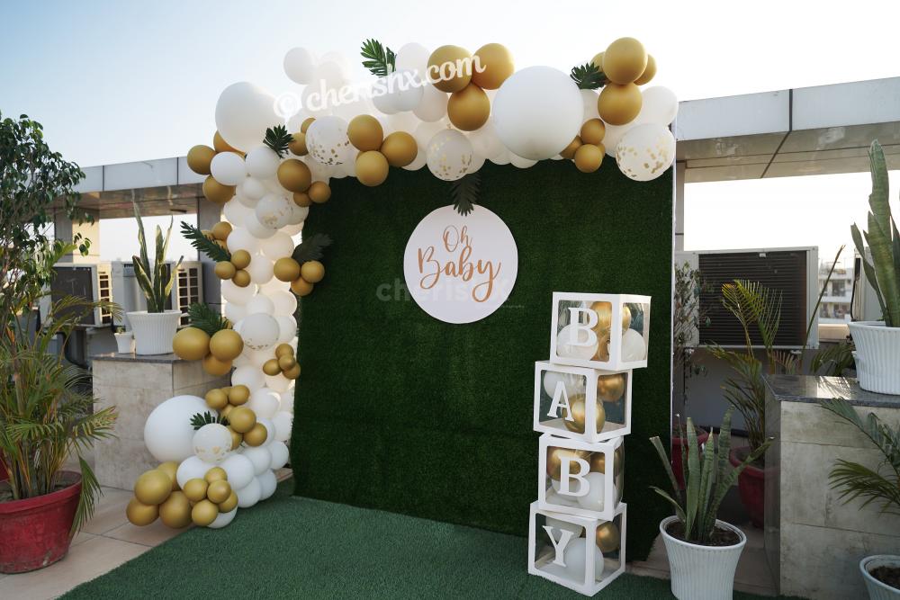 Celebrate the birth of your child with these bright Golden and White Baby Shower Decor!