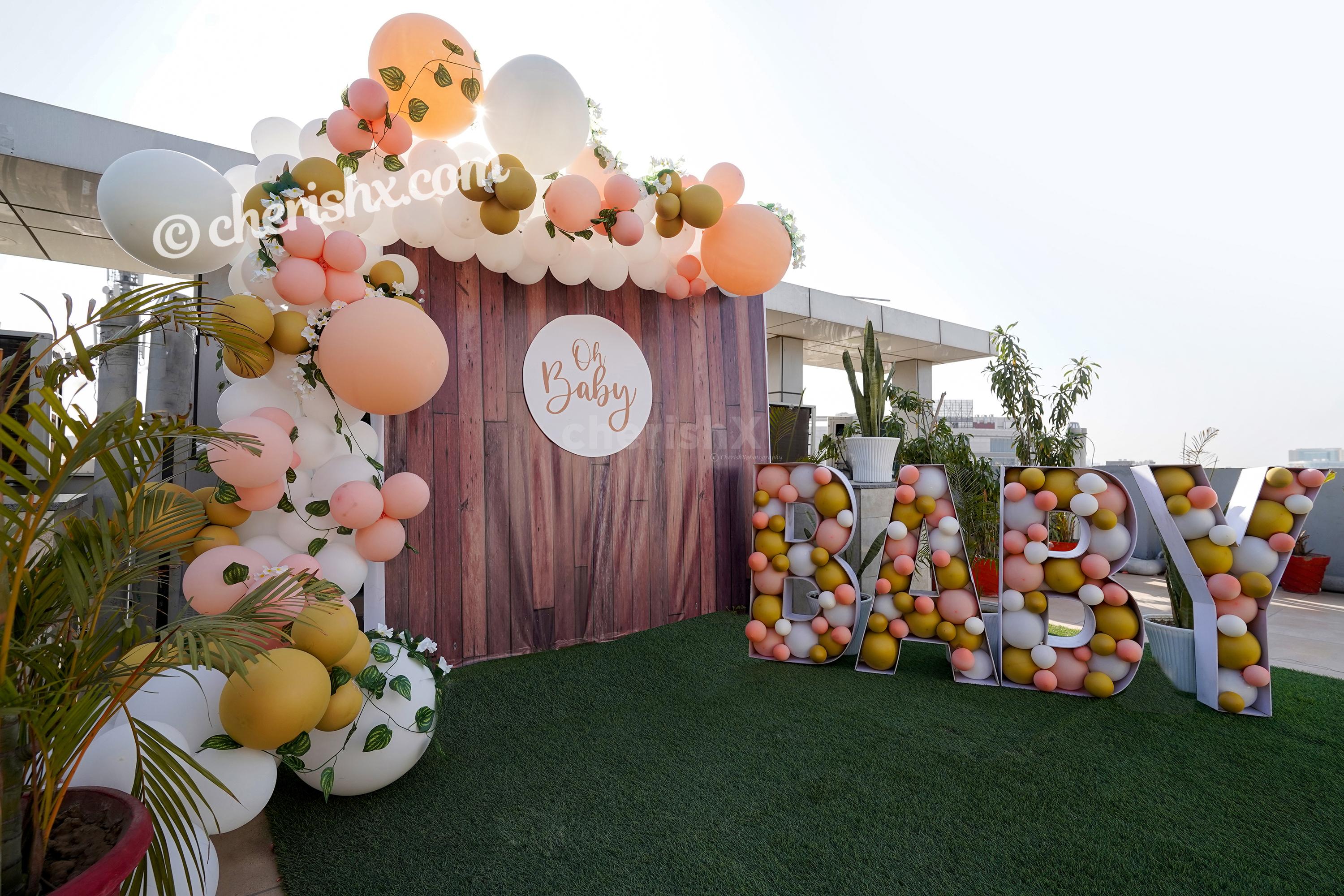 Throw a lovely Baby Shower for you close ones by booking CherishX's Peach Colored Baby Shower Decor !