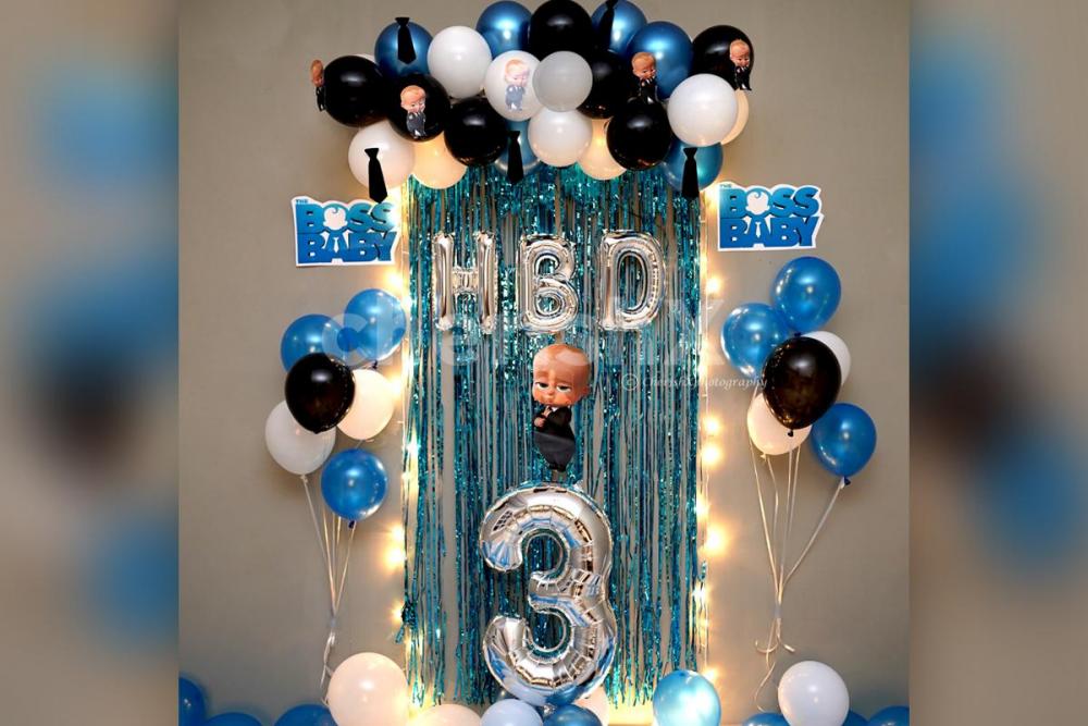 A simple Boss Baby Themed Balloon Decoration for a Kid's Birthday