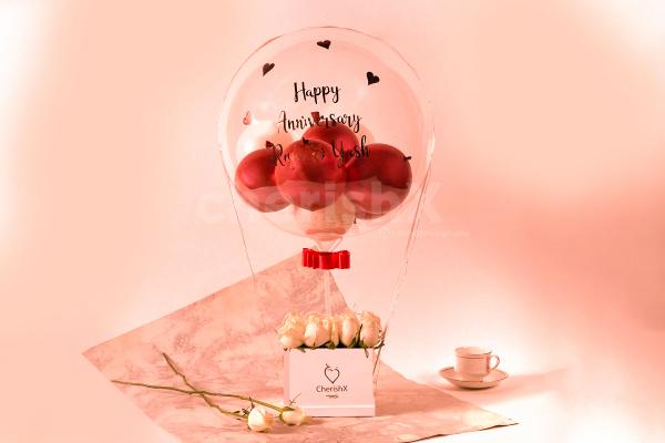 Express your warm feelings with CherishX's Rose Gold Balloon Bucket with White Roses!