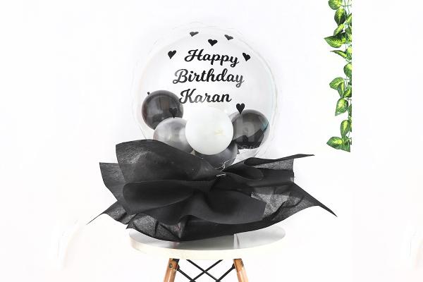 Wish a happy birthday to your close one with this fascinating Black Balloon Bucket!