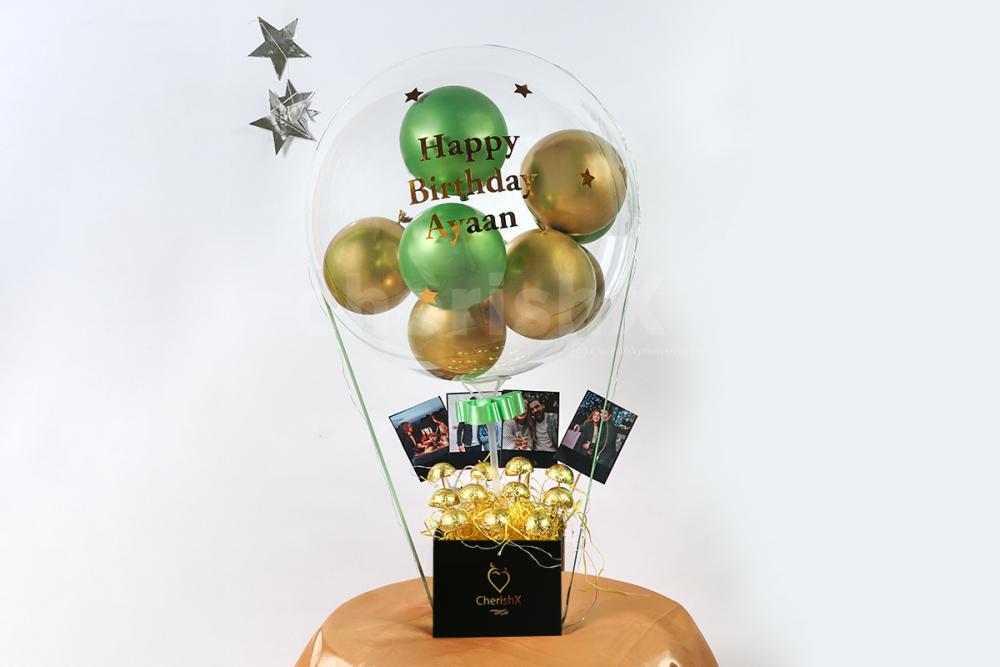 Startle your special one by gifting this beautiful Gold & Green Balloon Bucket with Chocolates!