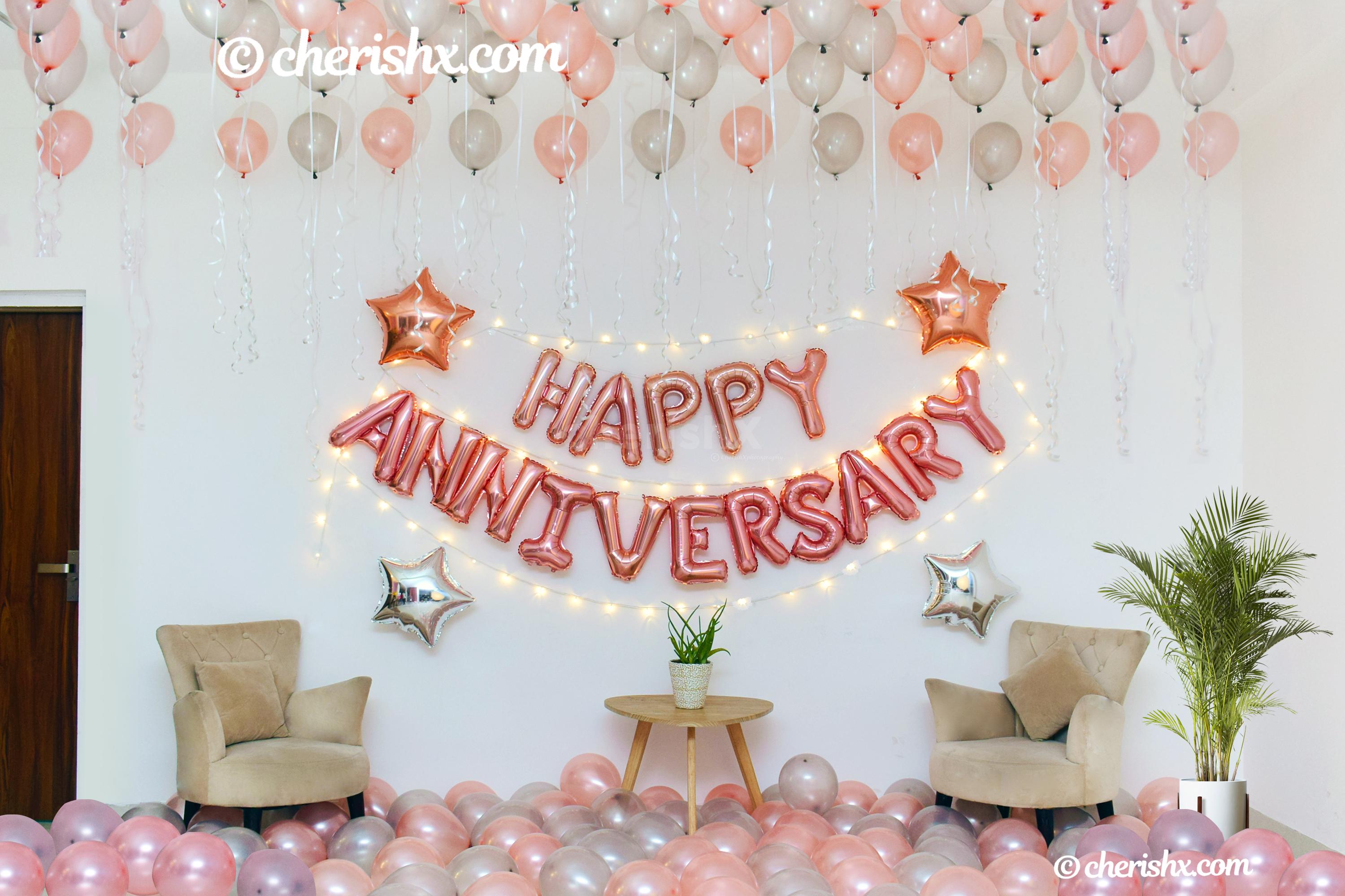 Book a beautiful Happy Anniversary Rose Gold Surprise Decor for your loved ones.