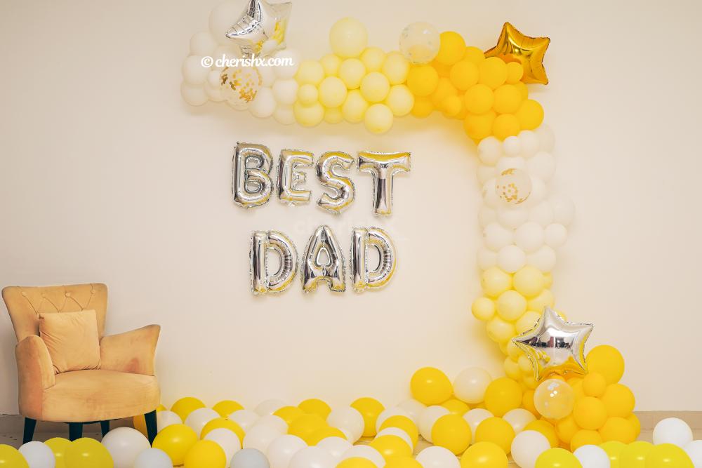 A Charming decoration filled with balloons to surprise your dad in the best way possible.