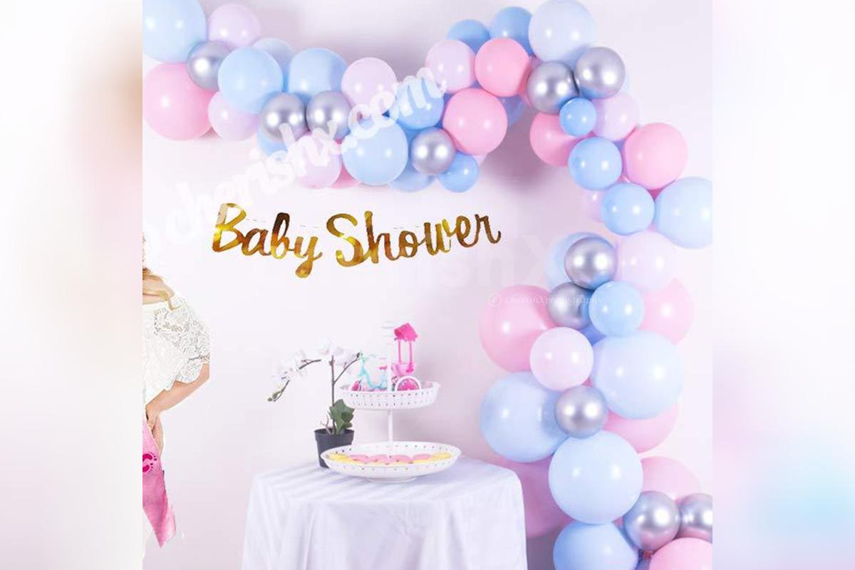 2. Make your baby shower celebration memorable by adding a pastel balloons baby shower decor!