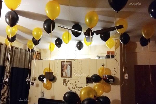 Balloon decoration at your home with candles and flower petal decoration in Hyderabad