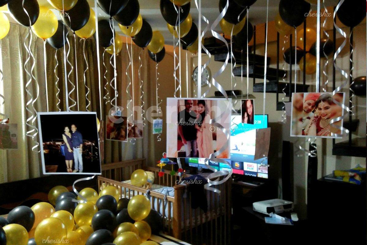 CherishX's Balloon Surprise Decor with hanging photos to surprise your close ones.