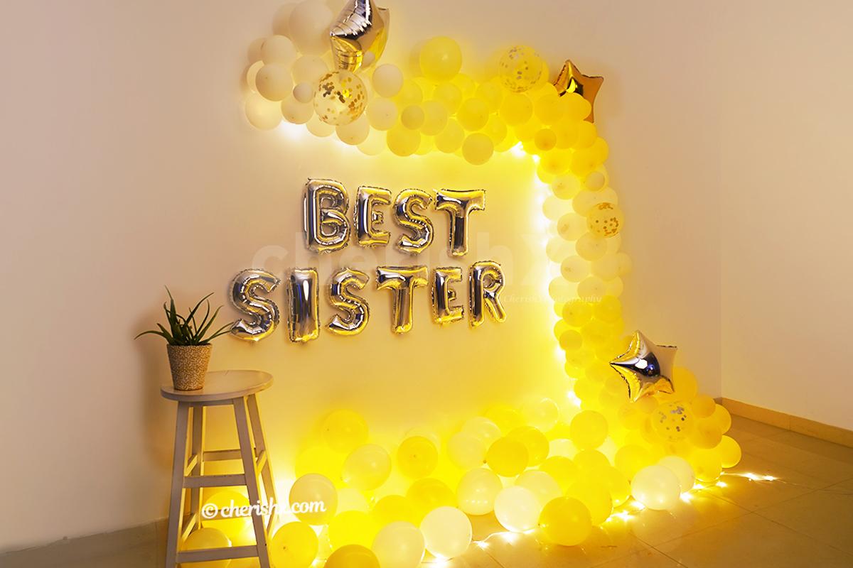 Surprise your sister with CherishX's Best sister balloon decoration.