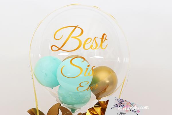Book CherishX's Green & White Sister Balloon Bucket and surprise her on Raksha Bandhan!