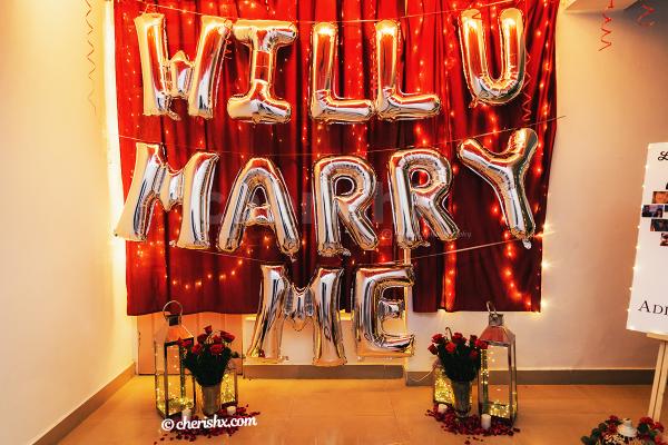 Wall decor with Will you Marry Me Foil Balloons and Led Lighting.