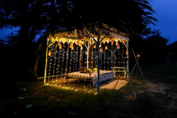 A Gorgeous Dinner on the swing setup for you and your partner in kukas jaipur