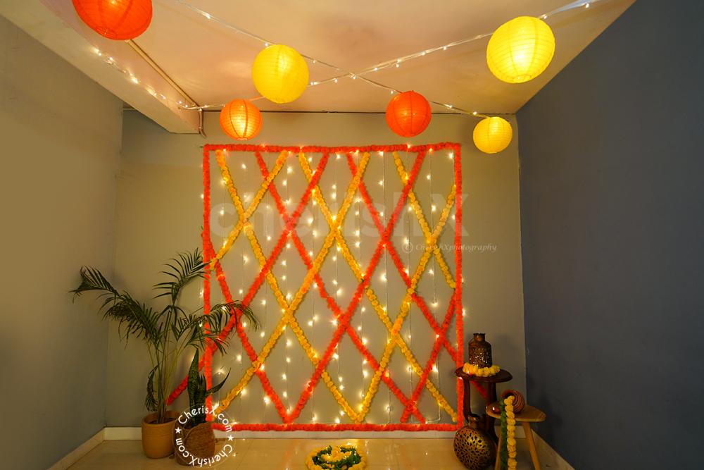 Decorate your room or hall on Diwali with CherishX's Festive Flower and Lantern Decoration.