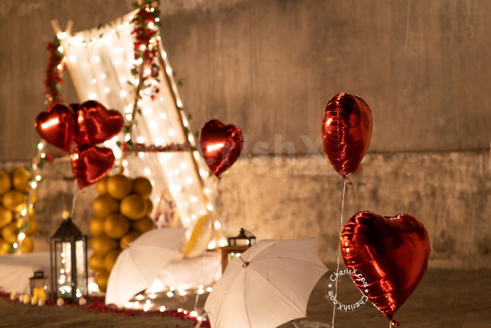 CherishX's Romantic Cabana Set up for proposal includes Lantern Decorations.