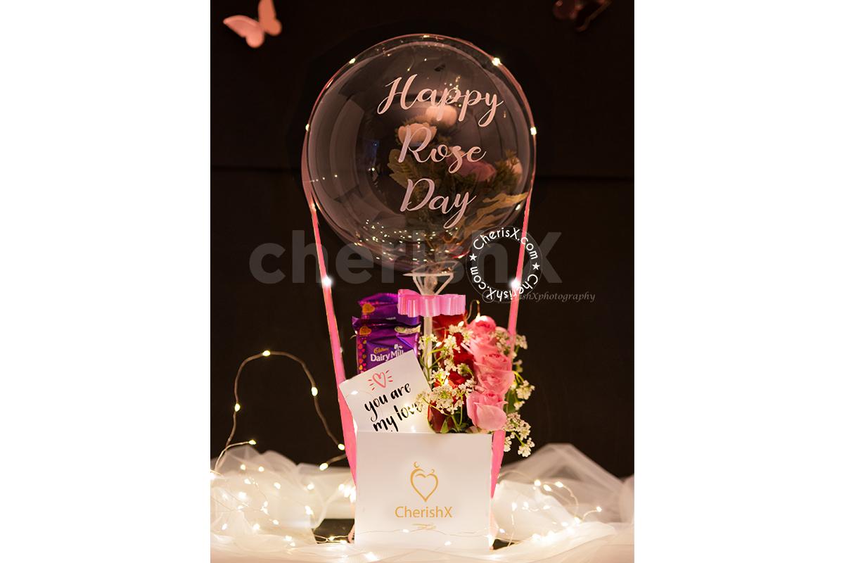 Get a beautiful Candy Flowers Balloon Bucket for your special one.