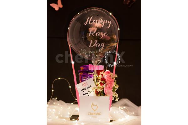Get a beautiful Candy Flowers Balloon Bucket for your special one.